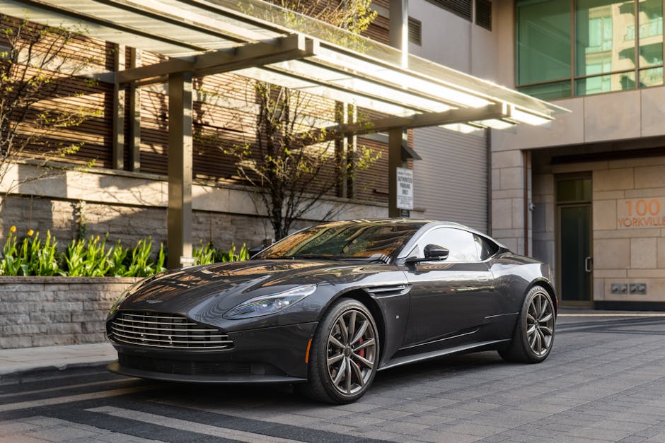 Sleek Aston Martin DB11 parked at Yorkville, Toronto, showcasing modern luxury